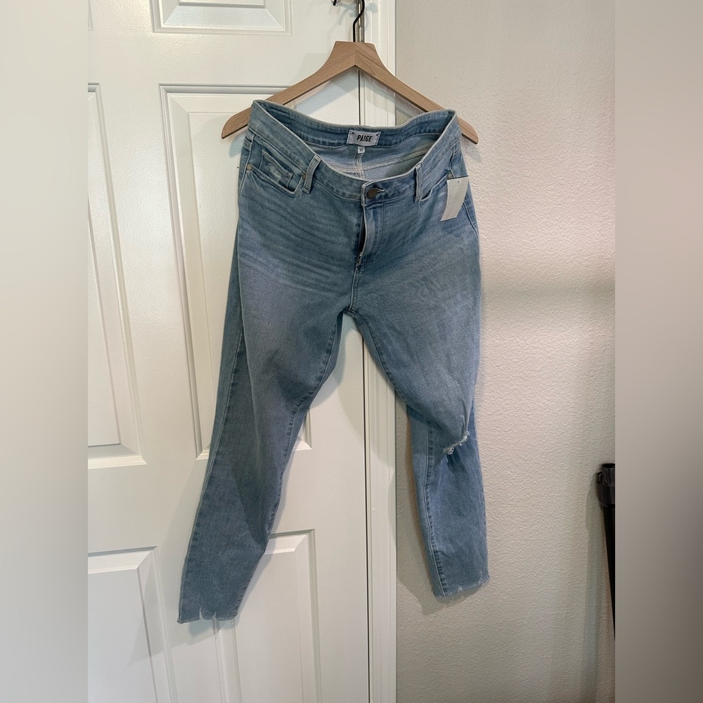 Paige Light Wash Distressed Hem Skinny Jeans